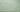 Water droplets on laminated light green fabric. Waterproof grass green fabric. 100% laminated cotton.