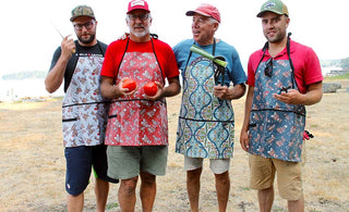 4 men wearing Splash Fabric aprons and starting to cook