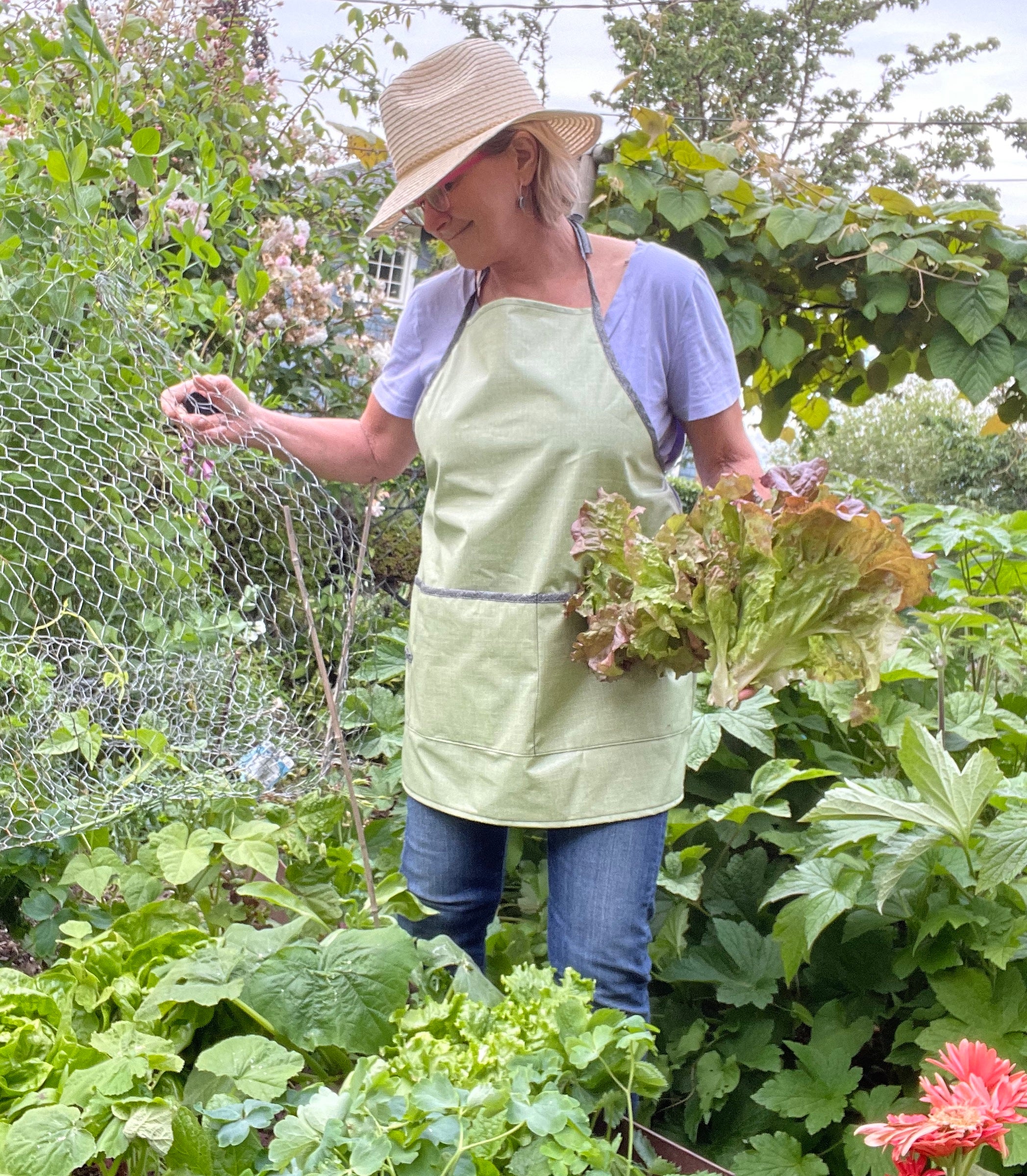 Tracy wearing GRASS colored green apron