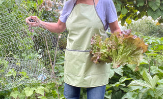 Tracy wearing GRASS colored green apron